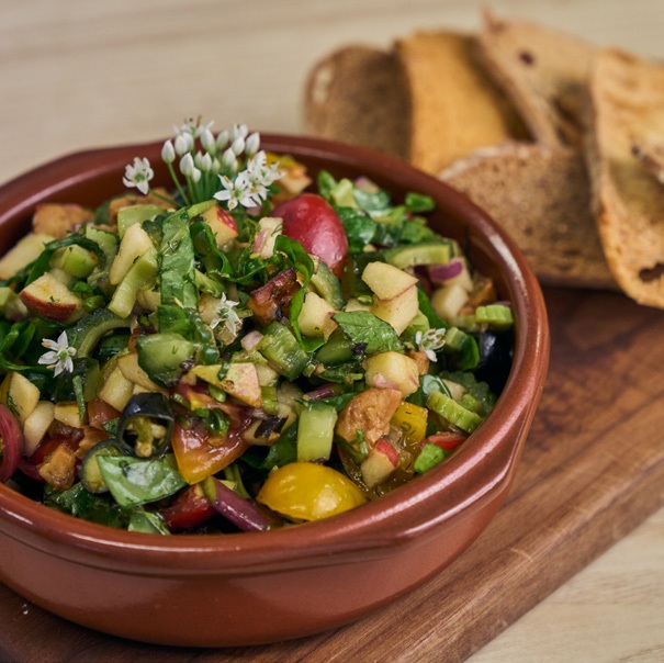 A colorful salad served at a table